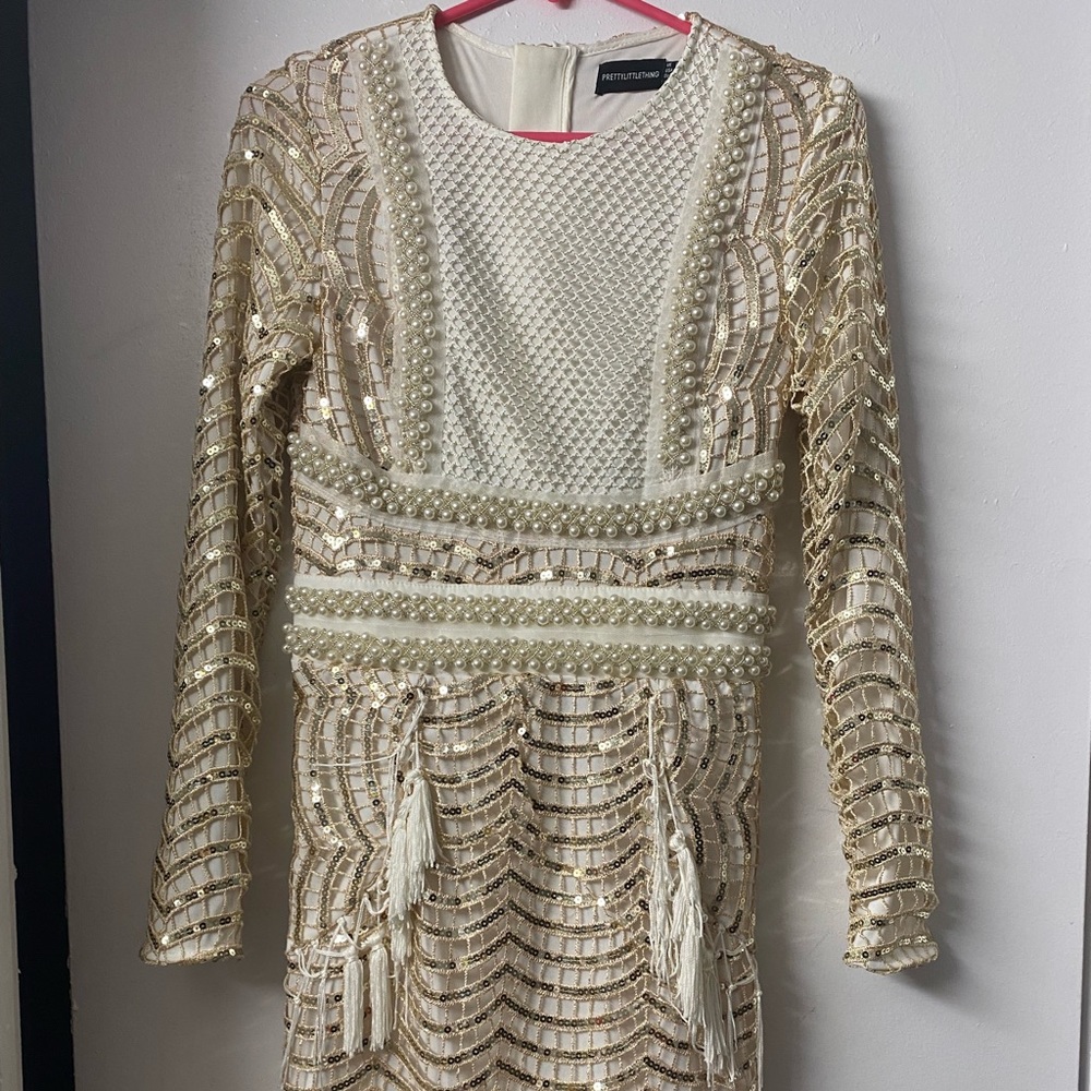 Gold and cream beaded dress with fringe. Size 4